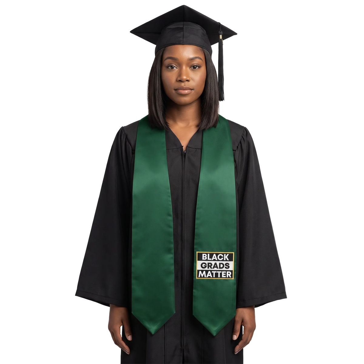 Hunter green graduation stole with pointed ends and a black-and-white BLACK GRADS MATTER patch with a gold border on one side.

